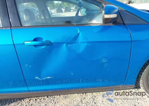 2014 Ford Focus Se z USA, uszkodzony, nr VIN 1FADP3F27EL293060